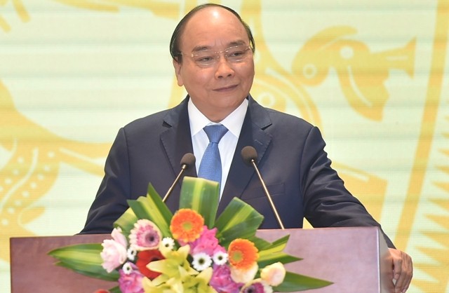 Thủ tướng Nguyễn Xuân Phúc phát biểu chỉ đạo Hội nghị triển khai nhiệm vụ ngân hàng năm 2021. - Ảnh: VGP/Quang Hiếu