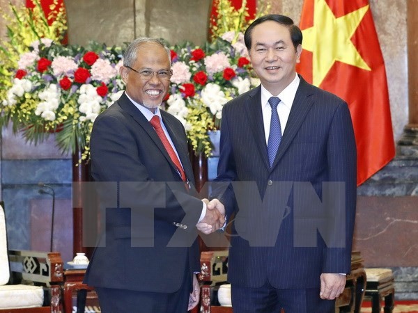 Chủ tịch nước Trần Đại Quang tiếp Bộ trưởng Bộ Tài nguyên và Môi trường Singapore Masagos Zulkifli. Ảnh: TTXVN