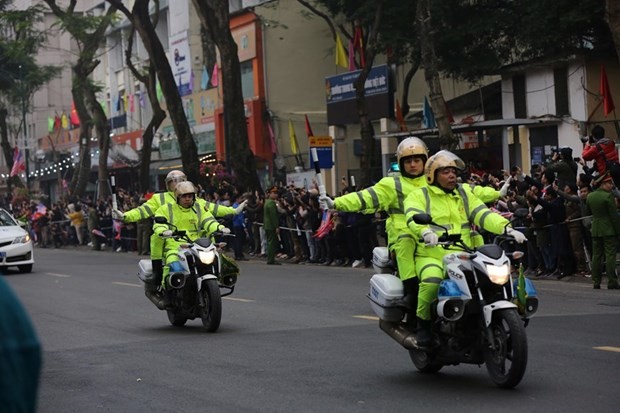Lực lượng Cảnh sát giao thông làm nhiệm vụ dẫn đường cho đoàn xe của Chủ tịch Kim Jong-un vào sáng 26/2 (Ảnh: Minh Sơn/Vietnam+)
